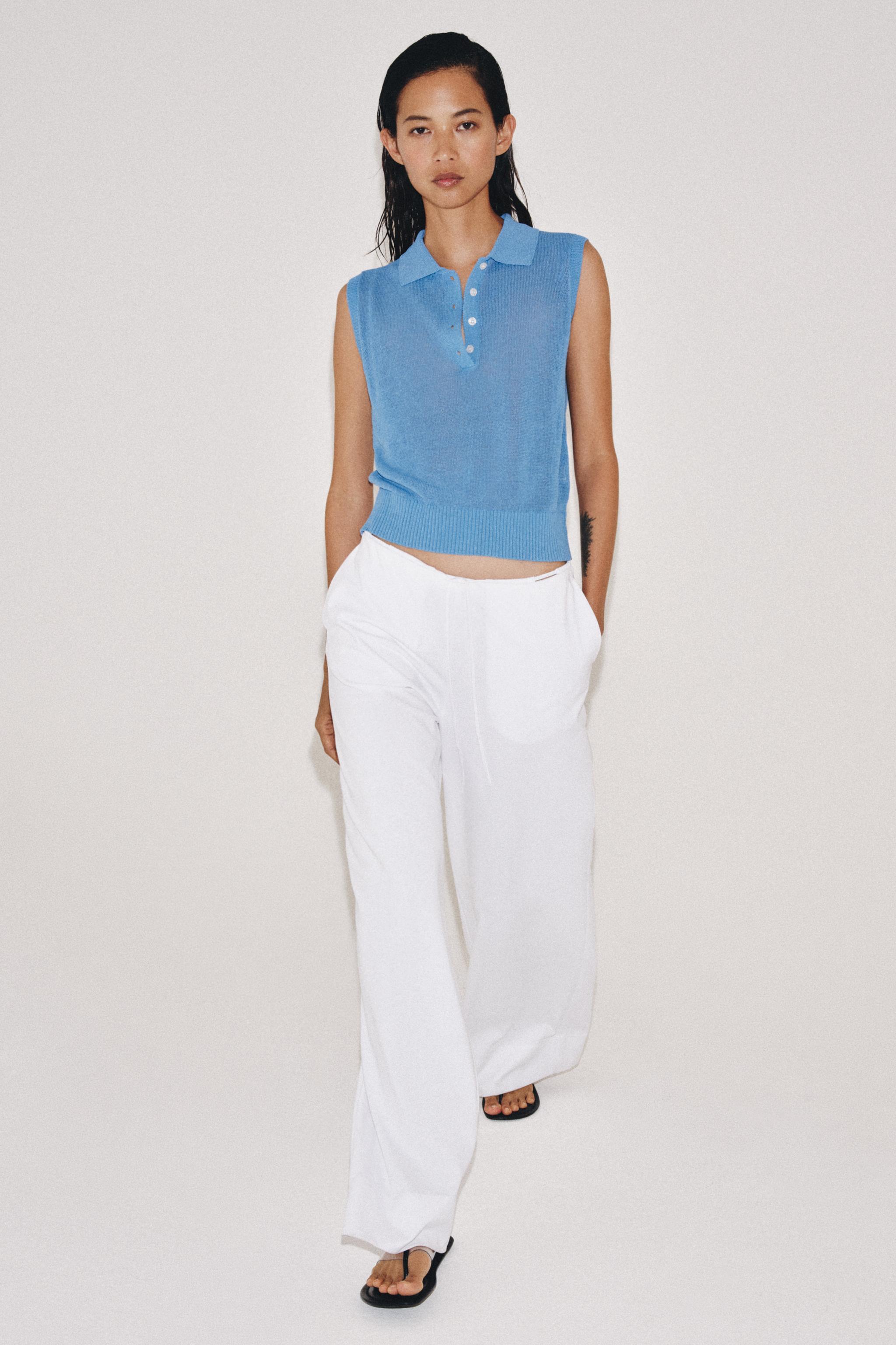 SLEEVELESS KNIT POLO